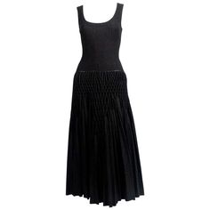 Jet-black, knit 'Plissé Abeille' dress from Azzedine Alaia dating to 2014 and seen on the runway. Dress is labeled a French size 38. Approximate un-stretched measurements: shoulder 13", bust: 28", waist 24", and length 48". Zips up center at back. Fabric content: 80% wool, 10% polyamide, 5% viscose, and 5% polyester. Made in Italy. Fabric is very substantial. New. Retail price was $7500. Cher Horowitz, Azzedine Alaia, Event Outfit, Inspo Outfit, Herve Leger, Sonia Rykiel, Black Knit, Jet Black, Pleated Dress