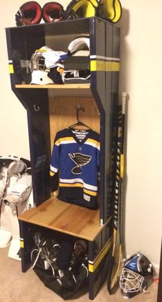 a hockey locker is shown in the corner of a room filled with sports gear and equipment