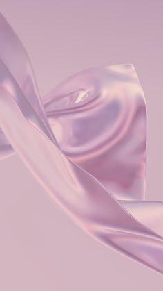 an abstract image of pink fabric on a purple background, with very long flowing folds