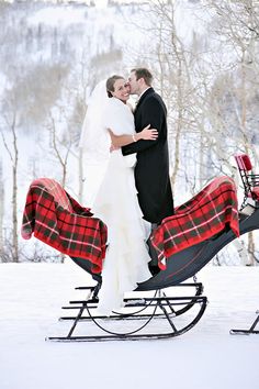 the bride and groom are posing for pictures in their wedding attire, with red shoes