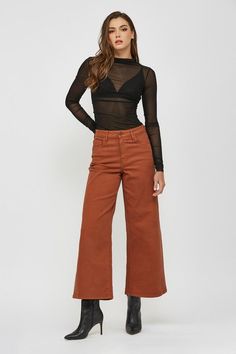 Rust wide-leg denim jeans. 70% Cotton, 24% Lyocell, 5% Polyester, 1% Spandex Waist Hips Front Rise Inseam Length 1/24 27 inches 31 inches 10 inches 27.5 inches 38 inches 3/25 28 inches 32 inches 10.5 inches 27.5 inches 38 inches 5/26 29 inches 33 inches 10.5 inches 28 inches 38 inches 7/27 30 inches 34 inches 11 inches 28 inches 38 inches 9/28 31 inches 35 inches 11 inches 28 inches 39 inches 11/29 32 inches 36 inches 11.5 inches 28 inches 39 inches 13/30 33 inches 37 inches 12 inches 28 inches Wide Leg Jeans With Five Pockets For Fall, Fall Wide Leg Cropped Jeans With Five Pockets, Trendy Cropped Wide Leg Pants For Fall, Stretch Flare Jeans For Fall, Fall Wide-leg Jeans, Stretch Wide-leg Flare Jeans For Fall, Fall Stretch Wide-leg Flare Jeans, Stretch Wide Leg Cropped Jeans For Fall, Fall Wide Leg Stretch Cropped Jeans