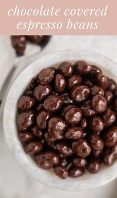 chocolate covered espresso beans in a white bowl