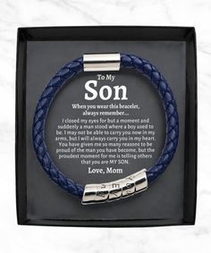 a blue leather bracelet with the words to my son on it in a black box