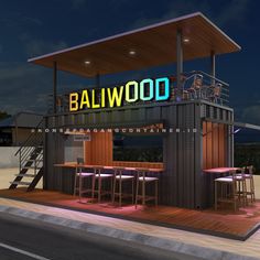 an outdoor bar with stools and lights on the roof, next to a street