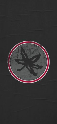 a black background with a red and white circle in the center that has an image of a mosquito on it