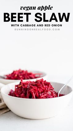 beet slaw with cabbage and red onion in a white bowl on a table