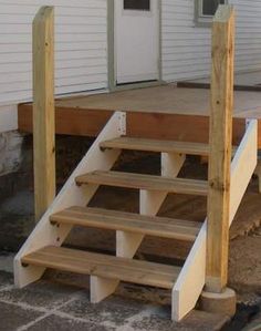 the steps are made out of wood and have no railings or posts on them