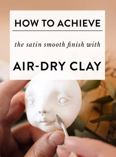 someone is holding an air dry clay face