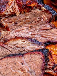 some meat is sitting on a cutting board