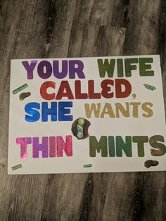 a sign that says, your wife called she wants thin mints on the table