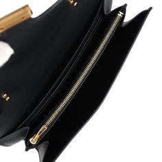 This Constance Wallet To Go is in Black epsom leather with gold hardware and has tonal stitching, metal "H" snap lock closure, open front compartment and removable crossbody strap.The interior is lined with Black epsom leather and two main compartments with six credit card slots and a zippered center compartment with Hermes H lock pull.Collection: WOrigin: FranceCondition: New and never worn (plastic on hardware) Accompanied by: Hermes box, felt, strap, strap dustbag and ribbonMeasurements: 8" w Luxury Wallets With Detachable Strap Crossbody, Gold Wallet On Chain With Gold-tone Hardware For Business, Luxury Travel Wallets With Gold-tone Hardware, Gold Wallets With Detachable Strap For Formal Occasions, Gold Formal Wallet With Detachable Strap, Evening Bag In Epsom Leather With Metal Hardware, Classic Evening Wallets With Detachable Strap, Classic Office Wallet On Chain With Gold-tone Hardware, Luxury Business Clutch With Gold-tone Hardware