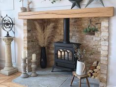 a wood burning stove sitting inside of a living room