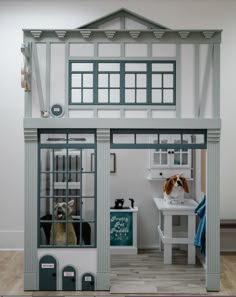 a doll house with a dog in it