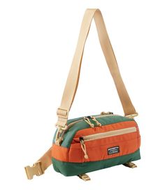 an orange and green bag with straps on it