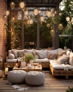 a living room filled with lots of furniture and lights