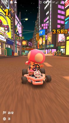 an image of mario kart racing on the street