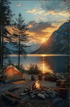 a camp site with a tent and fire in the foreground at sunset near a body of water