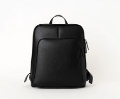 The Olivia Backpack is the most sleek and stylish backpack we've made! Conveniently made to store all the necessary things, including any 13" laptop.  Plenty of pockets to hold and store all the essentials (phone, Chapstick, wallet, hand sanitizer, etc.). Use it for work, school, travel, and everything else in-between. A Place For Everything, Stylish Backpack, Bag Details, Stylish Backpacks, In Between, Work Bag, Backpack Straps, Black Hardware, Backpack Purse