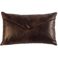 a brown leather pillow with an envelope on it