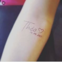 a woman's arm with a tattoo that says, this is love