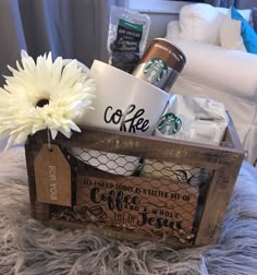 a wooden box with coffee and other items in it on a furnishing area