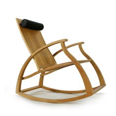 a wooden rocking chair on a white background