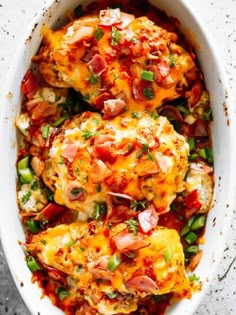 a casserole dish with meat, cheese and vegetables