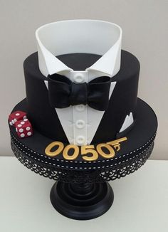 a black and white cake with a casino theme on top