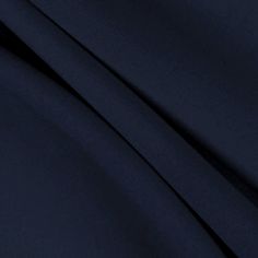 an image of a close up view of a dark blue fabric material that is very soft