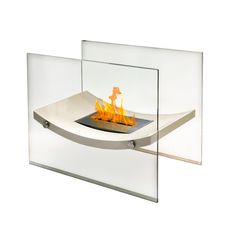 a fire place with two glass panels on each side and an open flame in the middle