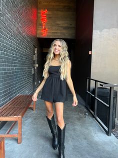 nashville outfit inspo | cowboy boots | black boots | denim outfit | western wear | concert outfit inspo | country concert outfit | country music festival | denim | nashville | tennesse | girls trip | bandeau top | dress and boots | midi dress | corset top | bachelorette nashville | rooftop nashville | camo skirt | camo | bachelorette outfit | white two piece set | nashville bachelorette | rodeo outfits Boots Denim Outfit, Outfit Inspo Country, Concert Outfit Country, Bachelorette Nashville, Country Concert Outfits, White Two Piece Set, Outfit Country, Outfit Western, Nashville Outfit