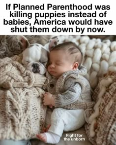 a baby sleeping on top of a pile of blankets next to a white dog with it's eyes closed