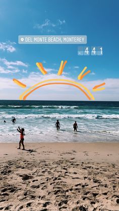 people are walking on the beach near the ocean