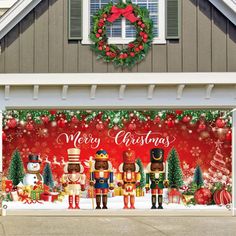 a garage decorated for christmas with nutcrackers and snowmen on the front