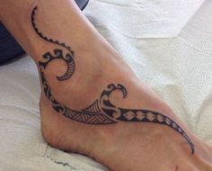 a foot with a tattoo design on it