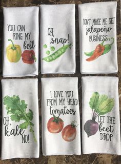 four napkins with vegetables printed on them