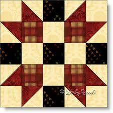 an image of a patchwork quilt with red and black squares on it's sides