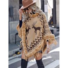 -Color: Khaki -Style: Casual -Pattern Type: Animal, Geometric -Details: Contrast Faux Fur, Asymmetrical, Fringe -Length: Long -Type: Poncho -Neckline: High Neck -Sleeve Length: Long Sleeve -Sleeve Type: Cloak Sleeve -Hem Shaped: Asymmetrical -Fit Type: Oversized -Fabric: Medium Stretch -Material: Fabric -Composition: 100% Polyester -Care Instructions: Machine Wash Or Professional Dry Clean -Belt: No -Sheer: No Ships In 7-10 Days S = 2/4, M = 6/8 L=10/12 0x=12 1x=14 2x=16 3x=18 4x=20 Boho - Weddi Animal Geometric, Black Shrug, Black Poncho, Polished Casual, Knitted Cape, Mode Boho, Fringed Poncho, Khaki Fashion, Poncho Sweater