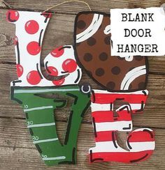 a wooden sign that says blank door hanger with an image of a boot and cherries on it