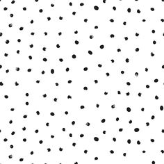 black and white polka dot pattern with small dots on the bottom half of the image