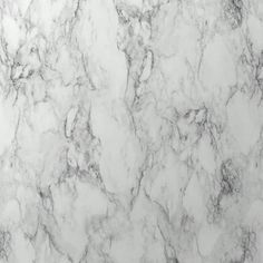 the marble is white and grey with black spots