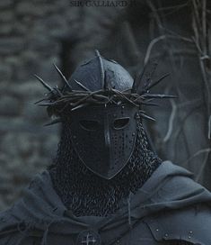 a man wearing a helmet with spikes on his head