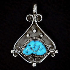 Elegant Turquoise Pendant by Legendary Navajo Artisan, James Little. Gorgeous Kingman Turquoise Stone set in Sterling Silver. This is his early work before he started working more with gold. This high quality piece would be a great addition to your collection. His jewelry is a reflection of the beauty around him.  Available at my Etsy Shop http://Far-Rider-West.com    #navajojewelry #turquoisependant #estatejewelry #western #nativeamericanjewelry #vintagejewelry #handmadeartisan #westernfashion #JamesLittle #cowboychic #uniquejewelry #WildWest Navajo Turquoise, Kingman Turquoise, Vintage Turquoise, American Jewelry, Turquoise Pendant, Native American Jewelry, Exquisite Jewelry, Silver Turquoise