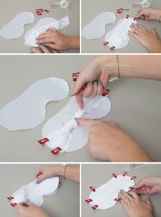 the process to make an origami shoe with white paper and red ribbon on it