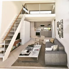 a living room filled with furniture and a stair case