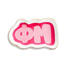 a pink and white plate with the word mom written in large letters on it's side