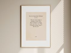 a framed quote hanging on the wall