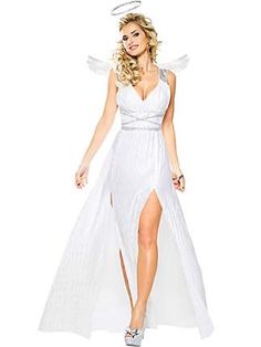 a woman in a white dress and angel wings