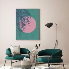 a living room with two green chairs and a pink painting on the wall above them