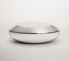 a white bowl sitting on top of a table